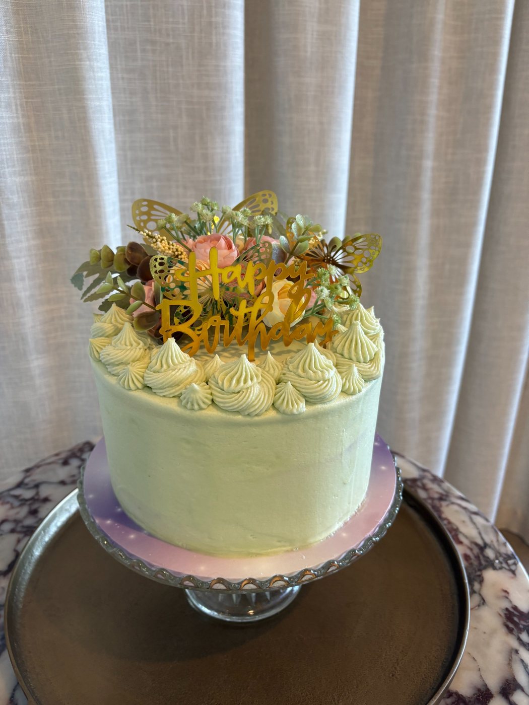 Mint floral birthday cake on stand